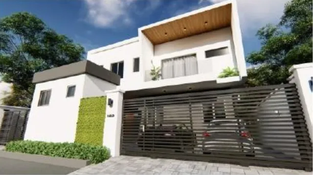 Atlantic View Estate, Lekki: home with feature green wall and gated forecourt